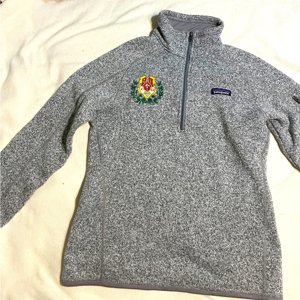 Patagonia 1/4 zip sweater with Chi Omega crest embroidery